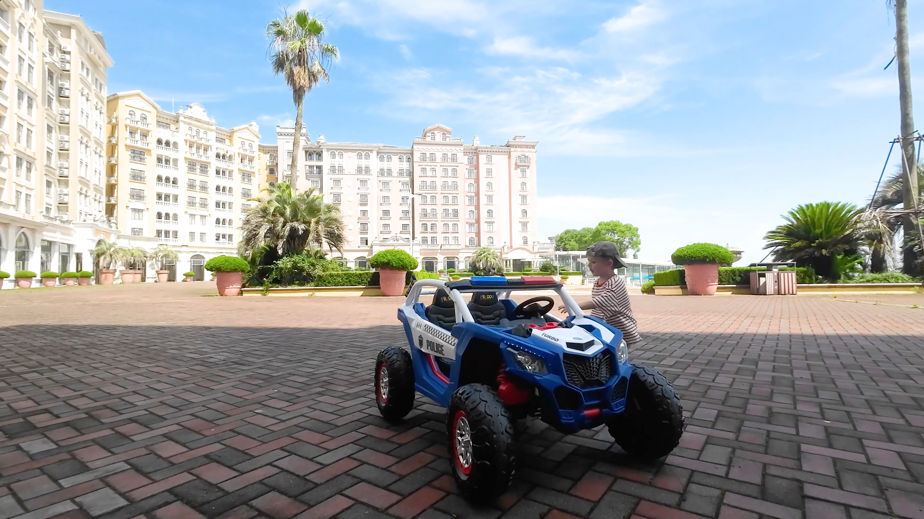 Person opening a Mercedes-AMG G63 kids ride-on car shipping box